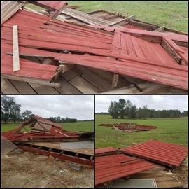 Barn blown down during hurricane. Lots of barn wood, tin, & doors. 