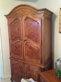 This beautiful armoire provides an abundance of clothing storage.