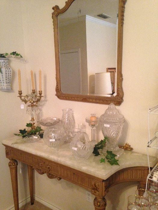 Marble top entry table and mirror; candelabra; crystal and glass selections