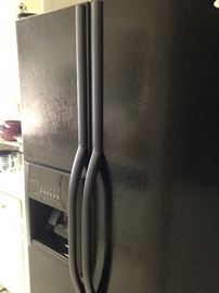 Black Whirlpool refrigerator