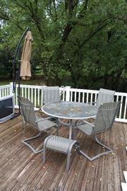Glass Top Patio Table with 4 Chairs Also Retractable Free Standing Deck Umbrella 