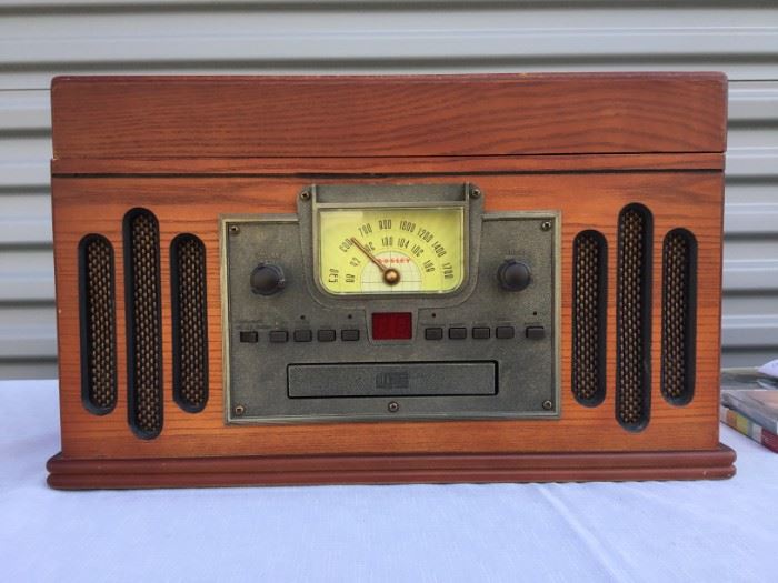 Turntable with Radio, CD and Cassette Player with Cd's https://ctbids.com/#!/description/share/53246