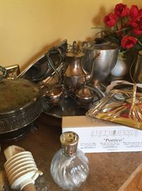 Lots of Silverplate serving pieces.
