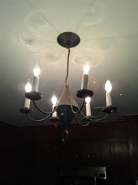 Pierced tin chandelier