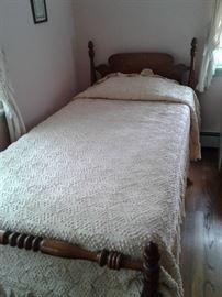 One of a pair of hand made bed covers