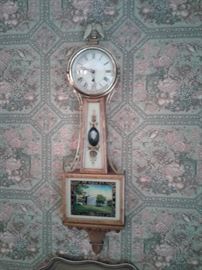 Reverse painted banjo clock with portrait of Lee