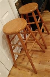 two nice wooden barstools