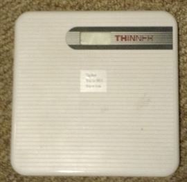Thinner Brand bathroom scale