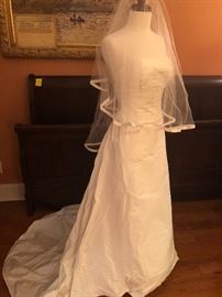 New, never worn, removed from box with tags. Size small, white, wedding gown with bridal accessories. Must see!
