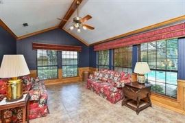 red floral sofa and love seat