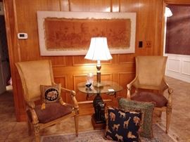 matching lion face side chairs and glass table with elephant base