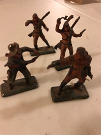 Painted cowboy and Indians -lead figures