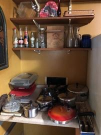 Some useful kitchen items, good pans, Nashville Beer, Coke bottles (more coke and beer bottles in laundry room)
