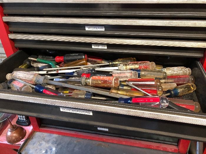 At least 4 large Craftsman tool boxes -full and labeled