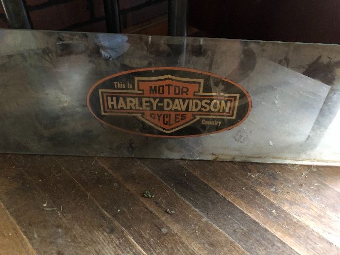 Harley-Davidson decal on vintage glass/car window