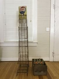 Metal Display Rack and Wooden Box with Bottles https://ctbids.com/#!/description/share/53737
