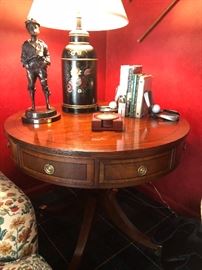 Round burled walnut side table with drawers, hand-painted lamps and bronze sculpture