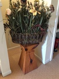 plant stand and dried floral arrangement