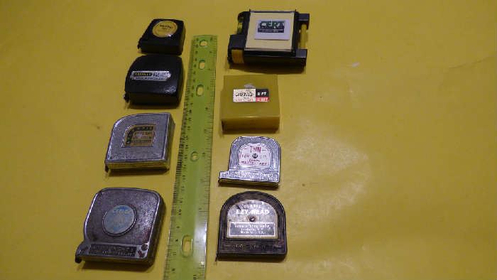 vintage measuring tape dispensers