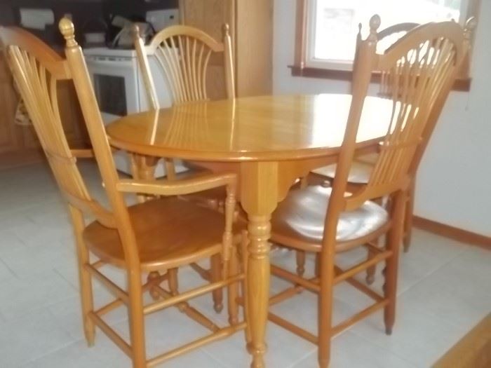 excellent dining table and chairs from The Sawmill in Wyandotte