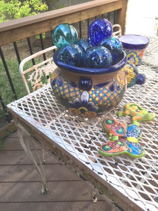 Several blown glass water ball, some new in package, and various glazed pottery from Mexico