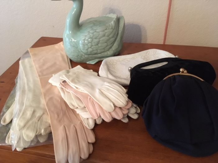 Assorted vintage ladies gloves, in various lengths, also clutch purses
