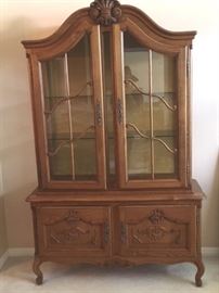 Modern china cabinet with glass doors and shelves