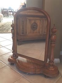 Antique vanity free standing vanity mirror that tilts and has lidded compartment on base with ball feet