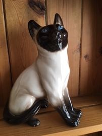 Glazed ceramic Siamese cat figurine made in Italy, signed