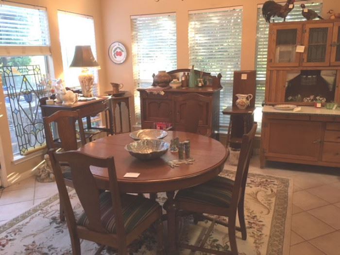 Antique oak dining table with leaves and total of 6 chairs, two sideboards, all in matching design, also antique Hoosier cabinet with all original accessories and hardware