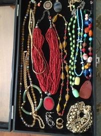 Various vintage necklaces, pendants, earrings, bracelets