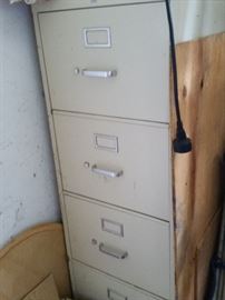Two 4-Drawer File Cabinets, one beige and one black