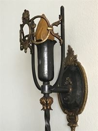 Rubbed bronze sconces. Nouveau aesthetic.