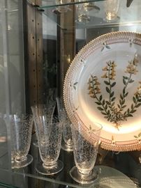 Flora Danica dinner plate, Royal Copenhagen with Michelangelo pattern by Baccarat, full suite of cordial, liquor, wine and water glasses.
