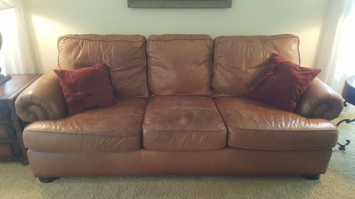 Brown leather sofa $100