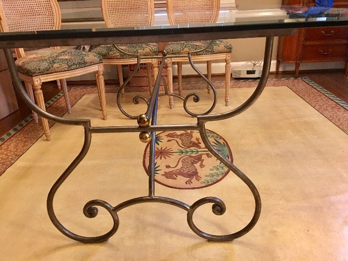 French Country Living Glass top table with steel and brass ornate base