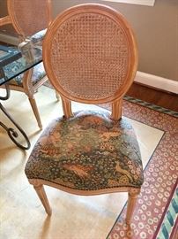 Six cane chairs (2 arm chairs) with animal print fabric