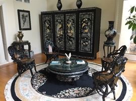 A Set of Four Black Carved Wood Root Chairs with Hand Painted Seat and Back. Chair Height: 34 inches. Seat Height: 18 inches x Width: 23 inches. In very good condition.