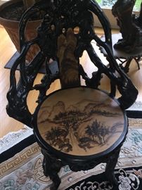 A Set of Four Black Carved Wood Root Chairs with Hand Painted Seat and Back. Chair Height: 34 inches. Seat Height: 18 inches x Width: 23 inches. In very good condition.