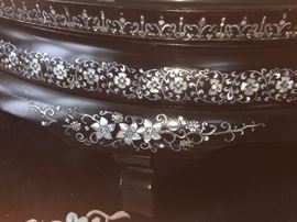 An Asian Round Coffee Table with Mother-of-Pearl inlays. Height: 31 x Diameter 15.5 inches. In excellent condition.