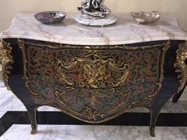 A Pair of Louis XV Style Marble Top Bombe Chests/Commodes/Console Tables. Hand painted floral design and gold gilt mounts. In excellent condition. Height 33.5 x Width 45.5 x Depth 20.5 inches.