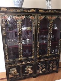 A Two-Piece Asian Black Lacquered Stone Inlayed China Cabinet/Breakfront. Four doors, six drawers and three shelves. Height 72 x Width 60 x Depth 19 inches. In excellent condition.