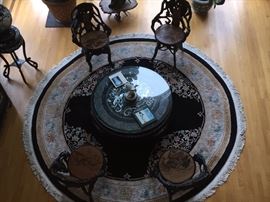 A Set of Four Black Carved Wood Root Chairs with Hand Painted Seat and Back. Chair Height: 34 inches. Seat Height: 18 inches x Width: 23 inches. In very good condition.