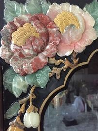 A corner six-sided curio Asian Stone and Mother of Pearl inlay black lacquered display cabinet. Height 75 x Diameter 24 inches. In excellent condition.