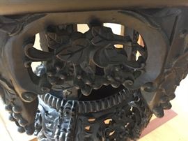 A Chinese Antique Eight-Sided Marble Top Carved Wood Table: Height 34 x Diameter 20 inches. In very good condition.