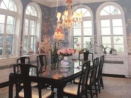 A Chinese-style Wood Carved Dining Room Table Set. Eight chairs with creme upholstered seat cushions. Table: 9 feet 4 inches x 3 feet 9 inches. In excellent condition.