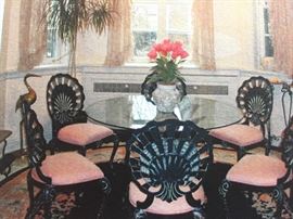 Glass Round Table with Six Sea Shell-Style Backed Chairs. In excellent condition.