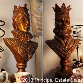 Gold King & Queen busts in the Master bedroom.  Goes well with such a regal master bedroom suite.