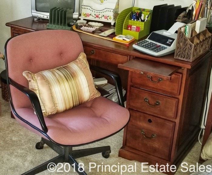 I dig the vintage office chair, and the desk is pretty swag too.