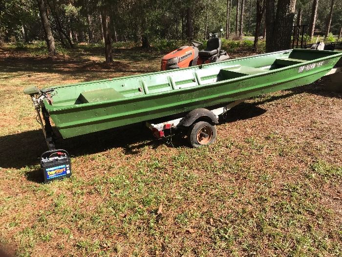 boat with trailer, trolling motor and battery.  